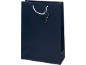 Dark blue gift bag with white rope handles and a blank tag.