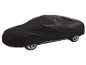 Black car cover for weather protection.