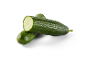 Two fresh cucumbers with water droplets, one cut in half.