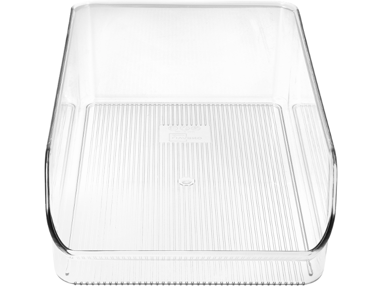 Transparent plastic storage container on a black background