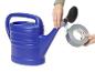 Blue watering can, hands attaching a shower head with duct tape.