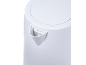Close-up of a white kettle with a water filter.