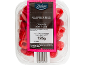 Fresh raspberries in a clear container with a pink and black label.