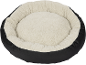 Round pet bed with a black exterior and a cream plush interior.