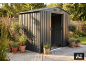Dark grey garden shed on a wooden deck, surrounded by potted plants and greenery.