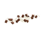 Chocolate cereal pieces, some star-shaped, splashing in milk.