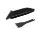 Black baking tray with a matching spatula.
