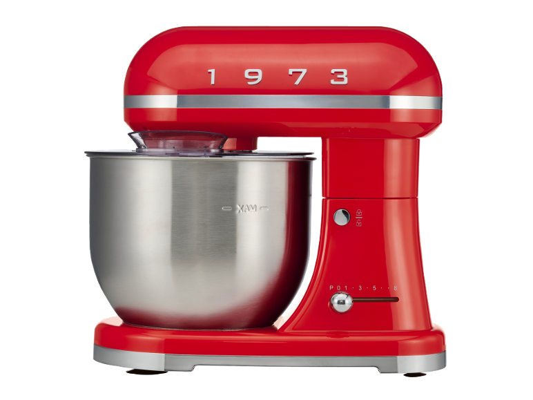 Red stand mixer with a stainless steel bowl and the number 1973 on top.