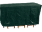 Green garden table protective cover with eyelets.