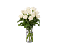 Bouquet of fresh white roses in a glass vase.