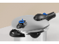 Stainless steel pressure cooker with a black handle and blue details on the lid.