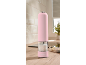 Pink electric salt or pepper grinder on a kitchen counter.