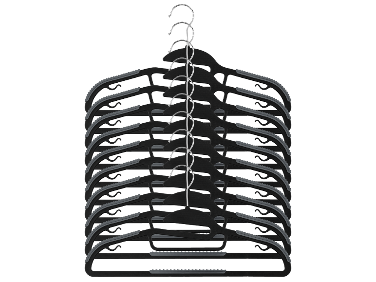 A stack of black clothes hangers with grey details and metal hooks.