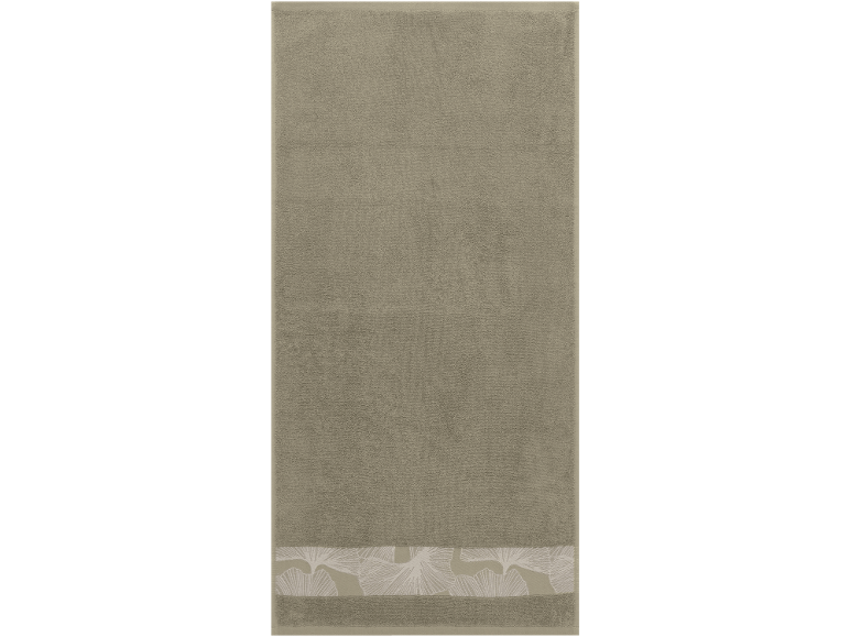 Grey-green cotton towel with a decorative strip of white leaves.