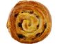 Golden-brown pain aux raisins, a swirled pastry with raisins, on a black background.