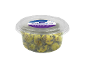 Grilled green olives in garlic-herb marinade in a clear plastic container.