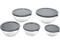 Set of five clear glass bowls with dark grey plastic lids, varying in size.