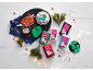 Christmas-themed fondant packs and decorations on a white table.