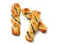 Puff pastry twists with chocolate on a white background.