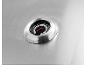 Stainless steel grill thermometer, showing a temperature of about 50 degrees.