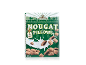 Cereal box with nougat pillows, some with visible filling, splashing into milk.