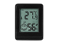 Black digital thermo-hygrometer with a display showing 27.9°C and 56% humidity.