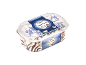 Container of stracciatella ice cream with chocolate chips and chocolate swirls.
