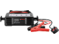 Black car battery charger with red and black jumper cables and a UK plug.
