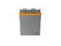 Grey and orange portable cooler with car and house icons on the lid.