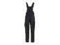 Dark grey work overalls with red details and pockets, back view.