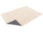 Beige textured rug from above, with a curled corner showing the gray underside.