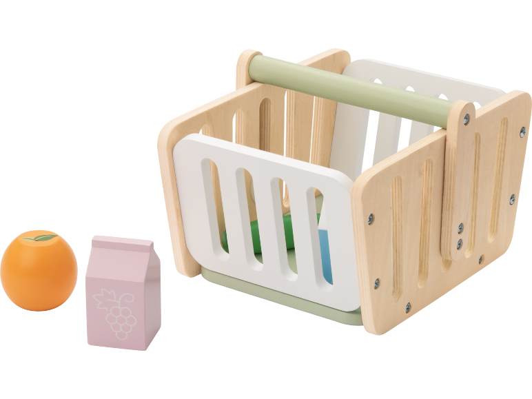 Wooden shopping basket with an orange and a grape juice carton.