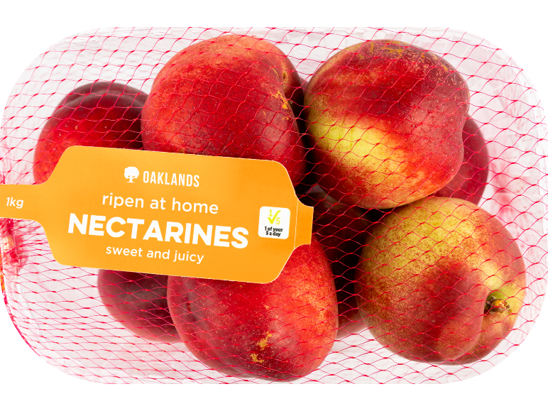Nectarines in a net with a label reading 'ripen at home NECTARINES sweet and juicy', 1kg, 1 of your 5 a day.