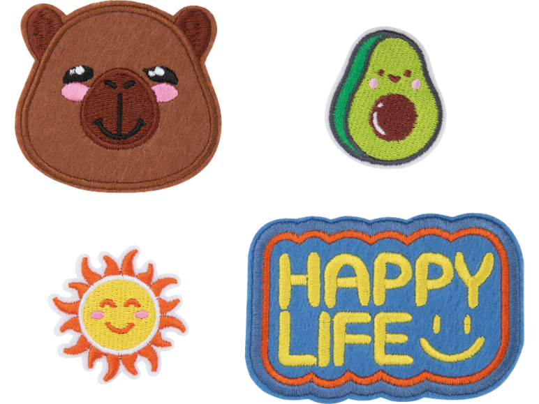 Four iron-on patches: a capybara, an avocado, a sun, and one with the text 'HAPPY LIFE'.