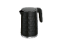 Black electric kettle with a textured hexagonal pattern and a silver base.