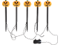 Five Halloween pumpkin garden stakes with black stakes and a battery box.