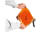 Hands opening an orange waterproof bag with a clip closure.