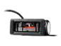 Portable air compressor with hose and inflation nozzle, stored in a compartment.