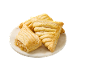 Four golden apple turnovers on a round marble plate.