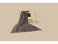 Dark brown knitted blanket with fringes draped over a light wooden bench.