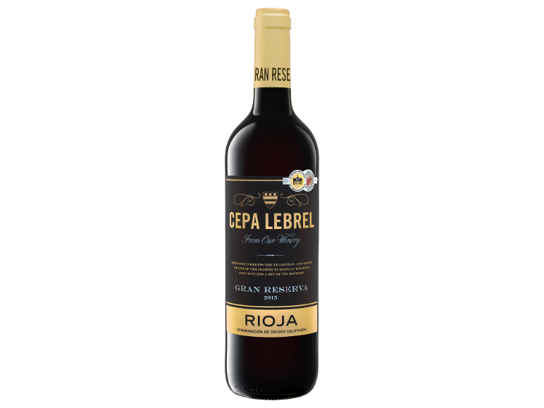 Bottle of red wine Gran Reserva Rioja 2015 with a gold and black label.