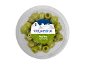 Green Nocellara olives with rosemary and thyme in transparent packaging.