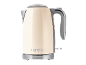 Cream retro electric kettle with the number 1973 on the front.