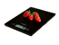 Digital kitchen scale with four fresh strawberries, displaying '74g'.