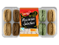 Tray of 12 chocolate, beige, and green macarons, labeled 'Macarons Selection' and 156 g.
