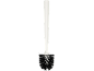 White toilet brush with black bristles on a black background.