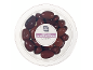 Kalamata olives with pits in a transparent container, with label