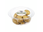 Halkidiki olives from Greece with thyme and pit in a transparent plastic container.