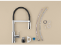 Kitchen faucet installation kit with chrome faucet, hoses, and seals.