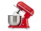 Red stand mixer with stainless steel bowl and attachments, featuring the number 1973.